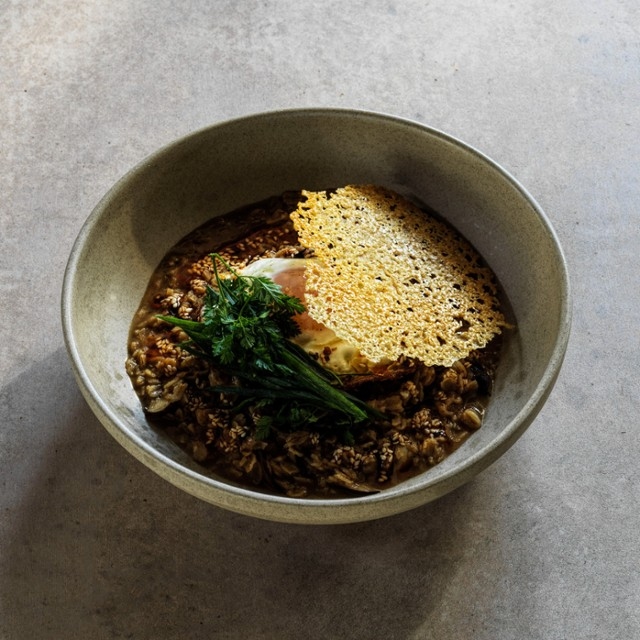 Savoury Porridge with Caramelised Onion, Shiitake, Fried Duck Egg, Chili & Crispy Parmesan
