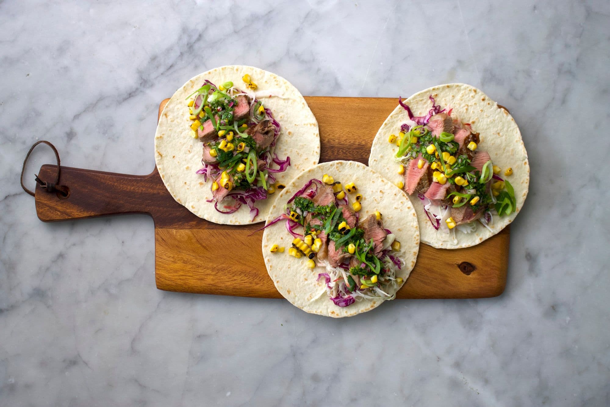 Chimichurri beef tacos with apple and cabbage slaw