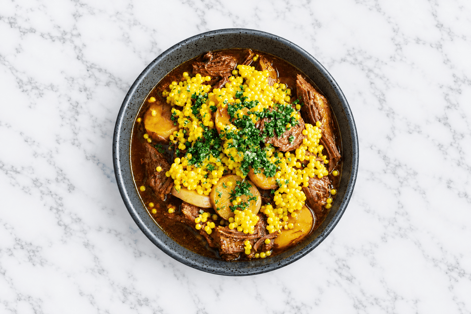 Slow-Braised Beef Brisket, Potato, Preserved Lemon, and Saffron Fregola